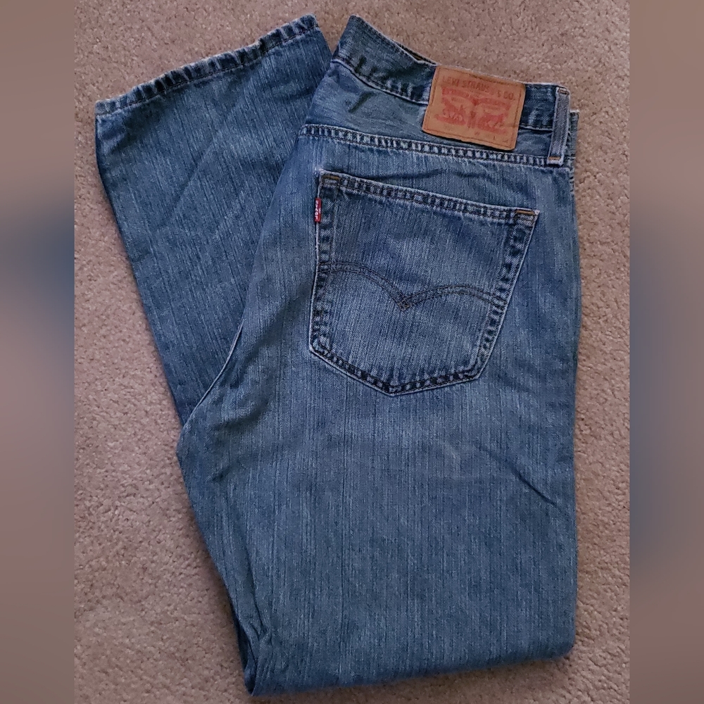 Levi's 559 relaxed straight 36x32 mens blue jeans, with distress marks